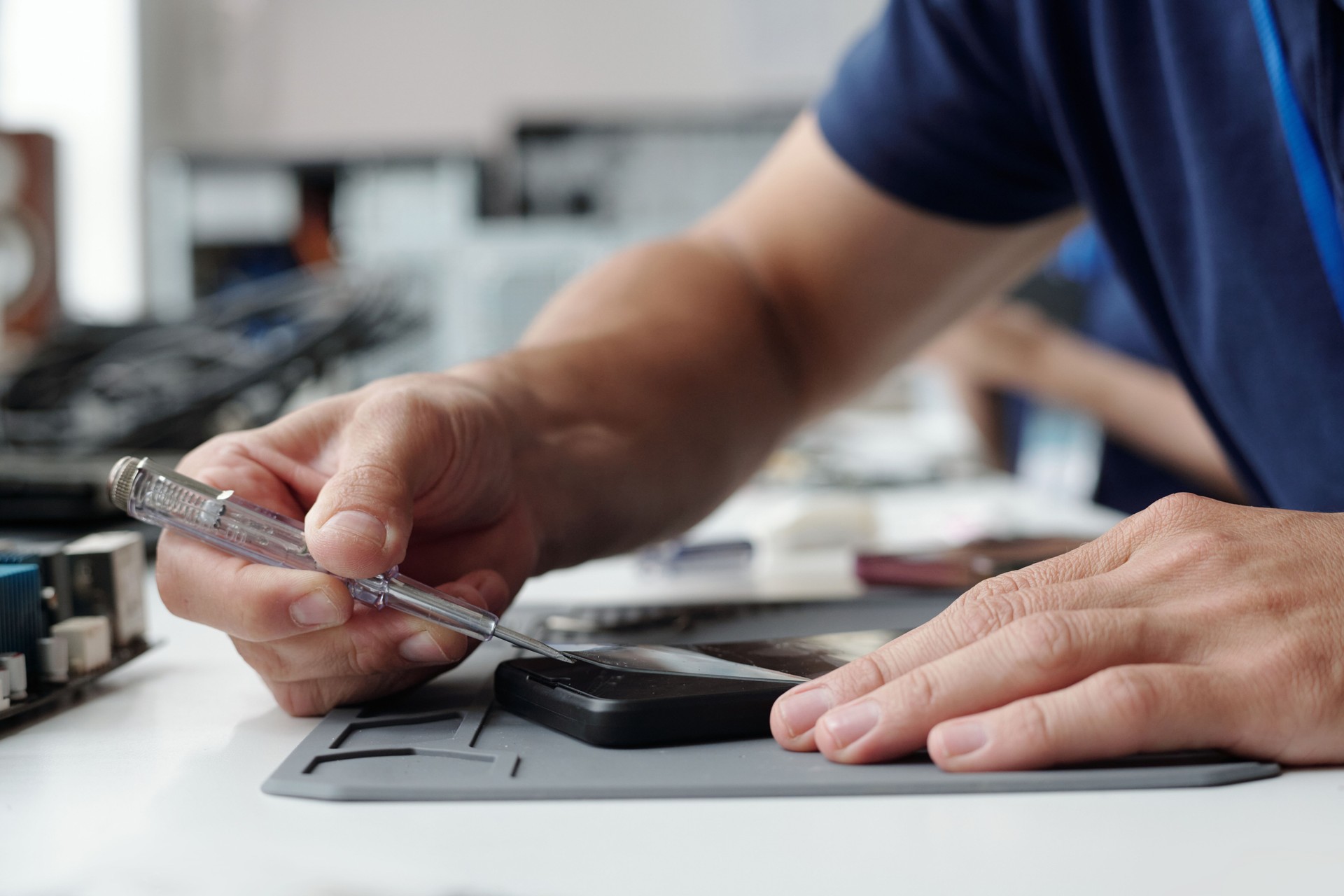 Repairing Smartphone Device with Precision Tools